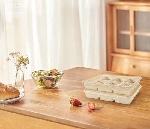 Boîte à raviolis biodégradable personnalisée en PP à base d'amidon de maïs avec couvercle et 12 compartiments